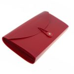 Red plastic accordion-style file folder with a button and string closure, shown on a white backgroundโan example of quality manufacturing stationery items in China.