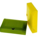 A green translucent plastic box lies flat next to a yellow upright one, both photographed on a white backgroundโtypical of manufacturing stationery items in China.
