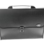 A black textured plastic briefcase with a handle and a central clasp, often produced by manufacturing stationery items in China, is shown on a white background.