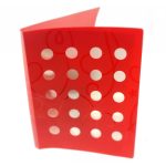 A red folder with a glossy finish, decorated with a pattern of large white polka dots and faint swirly designs, expertly crafted by specialists in manufacturing stationery items in China.