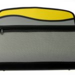 A zippered mesh organizer pouch with a yellow and gray design, black edges, and a visible front zipper pocket, manufactured as part of quality stationery items in China, photographed on a white background.