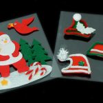 Two pieces of felt art: one shows Santa, a red bird, trees, and candy canes; the other displays three holiday hats with holly on a black background.