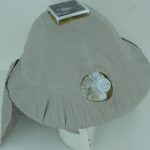 A light gray fabric hat with a built-in fan on the side and a small solar panel attached on top.