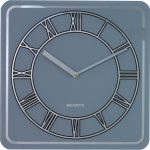 A square, gray wall clock with Roman numerals shows the time as 10:09. The word "QUARTZ" is printed near the bottom center.