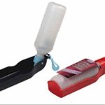 Two portable pet water bottles with attached drinking trays and clips, one black and blue, the other red, are shown side by side.