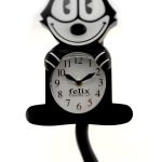 A wall clock shaped like Felix the Cat, with the clock face on its belly and a pendulum tail. The time reads about 11:00.