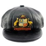 A black cap featuring the Australian coat of arms with a kangaroo, emu, and the word "Australia" on the front.
