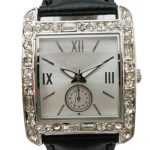 Square wristwatch with a jeweled silver bezel, Roman numerals on the face, a small subdial, and a black leather strap.