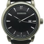 A wristwatch with a black dial, silver hour markers, the brand name "SUNBLON" at the top, a date window at 3 oโclock, and a black leather strap.
