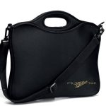 A black soft-sided carrying case with a shoulder strap and the words "It's Miller Time." printed in gold on the lower right corner.